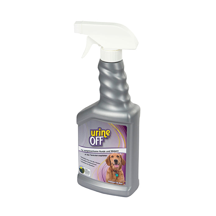 En större Urine-Off sprayflaska med etikett på: en hund samt information.